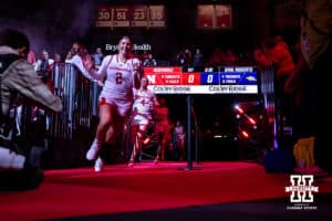 Nebraska Cornhusker guard Logan Nissley (2) leads the Huskers onto the court to take on the Oral Roberts Golden Eagles during a college basketball game on Wednesday, Nov. 19, 2025, in Lincoln, Nebraska. Photo by John S. Peterson.