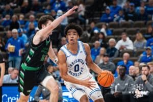Creighton Bluejay Jasen Green (0) looks to get past Garrett Anderson (16) during a basketball game against North Dakota on Wednesday, Nov 19, 2025, in Omaha, Nebraska. Photo by Brandon Tiedemann.