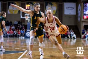 Nebraska Cornhusker guard Callin Hake (14) drives to the basket against North Dakota State Bison guard Jocelyn Schiller (30) during a college basketball game on Sunday, Nov 16, 2025, in Sioux Falls, South Dakota. Photo by John S. Peterson.