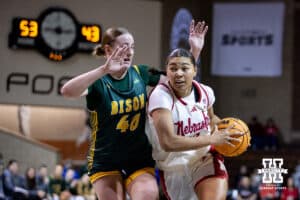 Nebraska Cornhusker forward Amiah Hargrove (33) drives the lane against North Dakota State Bison guard Abby Krzewinski (40) during a college basketball game on Sunday, Nov 16, 2025, in Sioux Falls, South Dakota. Photo by John S. Peterson.
