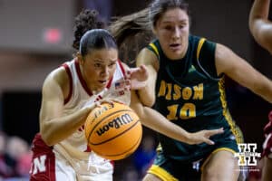 Nebraska Cornhusker guard Kennadi Williams (15) dribbles the ball past North Dakota State Bison guard Abby Graham (10) during a college basketball game on Sunday, Nov 16, 2025, in Sioux Falls, South Dakota. Photo by John S. Peterson.