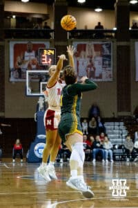 Nebraska Cornhusker guard Callin Hake (14) makes a three-point shot against the North Dakota State Bison during a college basketball game on Sunday, Nov 16, 2025, in Sioux Falls, South Dakota. Photo by John S. Peterson.