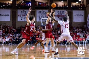 Nebraska Cornhusker forward Rienk Mast (51) makes a pass to forward Pryce Sandfort (21) in the first half during a college men’s basketball game on Saturday, Nov 15, 2025, in Sioux Falls, South Dakota. Photo by John S. Peterson.