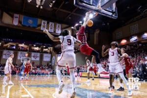 Nebraska Cornhusker forward Berke Buyuktuncel (9) makes a dunk against the Oklahoma Sooners in the first half during a college men’s basketball game on Saturday, Nov 15, 2025, in Sioux Falls, South Dakota. Photo by John S. Peterson.