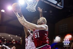 Nebraska Cornhusker forward Rienk Mast (51) makes lay up against Oklahoma Sooner forward Mohamed Wague (5) in the first half during a college men’s basketball game on Saturday, Nov 15, 2025, in Sioux Falls, South Dakota. Photo by John S. Peterson.