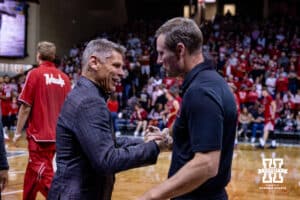 Nebraska Cornhusker head coach Fred Hoiberg and Oklahoma Sooner head coach Porter Moser shake hands before the college men’s basketball game on Saturday, Nov 15, 2025, in Sioux Falls, South Dakota. Photo by John S. Peterson.
