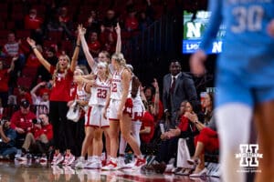 Nebraska Cornhuskers bench celebrates a three-point shot against the Creighton Bluejays during a college women’s basketball game on Wednesday, Nov. 12, 2025, in Lincoln, Nebraska. Photo by John S. Peterson.