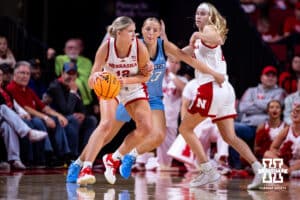 Nebraska Cornhusker forward Jessica Petrie (12) dribbles the ball against Creighton Bluejay guard Neleigh Gessert (23) in the third quarter during a college women’s basketball game on Wednesday, Nov. 12, 2025, in Lincoln, Nebraska. Photo by John S. Peterson.