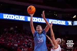 Creighton Bluejay center Elizabeth Gentry (35) makes a lay up against Nebraska Cornhusker guard Callin Hake (14) in the third quarter during a college women’s basketball game on Wednesday, Nov. 12, 2025, in Lincoln, Nebraska. Photo by John S. Peterson.
