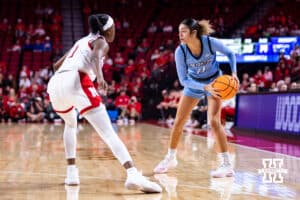Creighton Bluejay guard Kiani Lockett (11) looks to pass against Nebraska Cornhusker guard Hailey Weaver (1) in the third quarter during a college women’s basketball game on Wednesday, Nov. 12, 2025, in Lincoln, Nebraska. Photo by John S. Peterson.