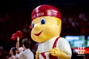 Nebraska Cornhuskers mascot Lil' Red was at the game cheering on the Huskers against the Creighton Bluejays during a college women’s basketball game on Wednesday, Nov. 12, 2025, in Lincoln, Nebraska. Photo by John S. Peterson.