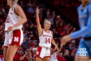 Nebraska Cornhusker guard Callin Hake (14) celebrates making a three point shot against the Creighton Bluejays in the first quarter during a college women’s basketball game on Wednesday, Nov. 12, 2025, in Lincoln, Nebraska. Photo by John S. Peterson.