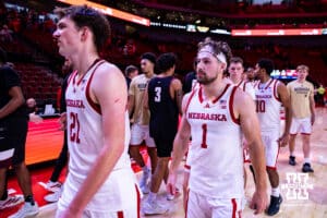 Nebraska Cornhusker forward Pryce Sandfort (21) and guard Sam Hoiberg (1) walk off the court after the win over the Maryland Eastern Shore Hawks during a college men’s basketball game on Tuesday, November 11, 2025, in Lincoln, Nebraska. Photo by John S. Peterson.
