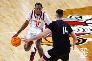 Nebraska Cornhusker guard Kendall Blue (2) drives the ball against Maryland Eastern Shore Hawk forward Joseph Locandro (14) in the second half during a college men’s basketball game on Tuesday, November 11, 2025, in Lincoln, Nebraska. Photo by John S. Peterson.