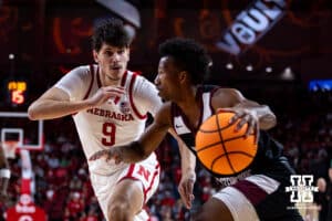 Nebraska Cornhusker forward Berke Buyuktuncel (9) defends against Maryland Eastern Shore Hawk Jaden Cooper in the second half during a college men’s basketball game on Tuesday, November 11, 2025, in Lincoln, Nebraska. Photo by John S. Peterson.