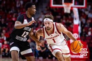 Nebraska Cornhusker guard Sam Hoiberg (1) dribbles the ball down the court against Maryland Eastern Shore Hawk guard Justin Monden (12) during a college men’s basketball game on Tuesday, November 11, 2025, in Lincoln, Nebraska. Photo by John S. Peterson.