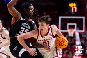 Nebraska Cornhusker forward Pryce Sandfort (21) drives the lane against Maryland Eastern Shore Hawk forward Christopher Flippin (35) during a college men’s basketball game on Tuesday, November 11, 2025, in Lincoln, Nebraska. Photo by John S. Peterson.