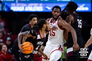Nebraska Cornhusker forward Jared Garcia (15) squeezes around Maryland Eastern Shore Hawk forward Christopher Flippin (35) when guarding guard Michael Teal (4) in the first half during a college men’s basketball game on Tuesday, November 11, 2025, in Lincoln, Nebraska. Photo by John S. Peterson.