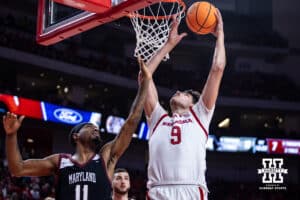 Nebraska Cornhusker forward Berke Buyuktuncel (9) makes a lay up against Maryland Eastern Shore Hawk guard Javoy Thompson (11) in the first half during a college men’s basketball game on Tuesday, November 11, 2025, in Lincoln, Nebraska. Photo by John S. Peterson.
