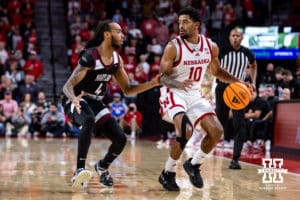 Nebraska Cornhusker guard Jamarques Lawrence (10) dribbles the ball against Maryland Eastern Shore Hawk guard Michael Teal (4) in the first half during a college men’s basketball game on Tuesday, November 11, 2025, in Lincoln, Nebraska. Photo by John S. Peterson.