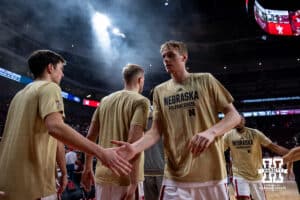 Nebraska Cornhusker forward Leo Curtis (33) gives five to Nebraska Cornhusker forward Pryce Sandfort (21) before a college men’s basketball game against the Maryland Eastern Shore Hawks on Tuesday, November 11, 2025, in Lincoln, Nebraska. Photo by John S. Peterson.