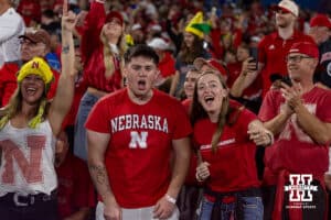 Nebraska Cornhusker fans celebrates a third quarter touchdowon against the UCLA Bruins during a college football game on Saturday, November 8, 2025, in Pasadena, California. Photo by John S. Peterson.