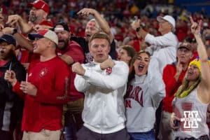Nebraska Cornhusker fans celebrates a third quarter touchdowon against the UCLA Bruins during a college football game on Saturday, November 8, 2025, in Pasadena, California. Photo by John S. Peterson.