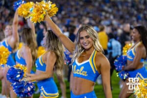 UCLA Bruins cheerleader poses for a photo during a college football game against the Nebraska Cornhuskers on Saturday, November 8, 2025, in Pasadena, California. Photo by John S. Peterson.
