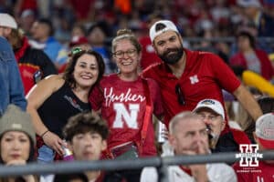Nebraska Cornhuskers fans pose for a photo before the start of the college football game against the UCLA Bruins on Saturday, November 8, 2025, in Pasadena, California. Photo by John S. Peterson.