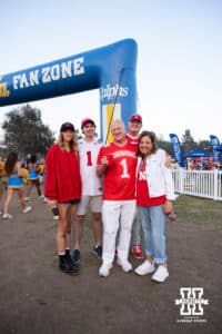 Nebraska Cornhusker fans tailgating, pose for a photo before the college football game against the UCLA Bruins on Saturday, November 8, 2025, in Pasadena, California. Photo by Shane Adams.