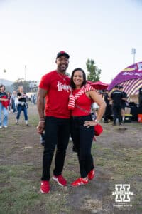 Nebraska Cornhusker fans tailgating, pose for a photo before the college football game against the UCLA Bruins on Saturday, November 8, 2025, in Pasadena, California. Photo by Shane Adams.