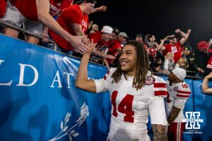 Nebraska Cornhusker quarterback TJ Lateef (14) give fives to the fans after the win over the UCLA Bruins during a college football game on Saturday, November 8, 2025, in Pasadena, California. Photo by John S. Peterson.