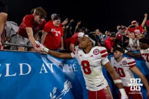 Nebraska Cornhusker defensive back Deshon Singleton (8) give five to the fans after the win over the UCLA Bruins during a college football game on Saturday, November 8, 2025, in Pasadena, California. Photo by John S. Peterson.