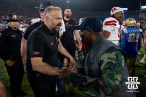 Nebraska Cornhusker head coach Matt Rhule and UCLA Bruins interim head coach Tim Skipper shake hands after the college football game on Saturday, November 8, 2025, in Pasadena, California. Photo by John S. Peterson.