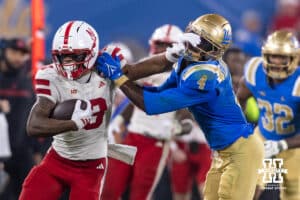 Nebraska Cornhusker wide receiver Nyziah Hunter (13) stiff arms UCLA Bruin defensive back Key Lawrence (4) in the four quarter during a college football game on Saturday, November 8, 2025, in Pasadena, California. Photo by John S. Peterson.