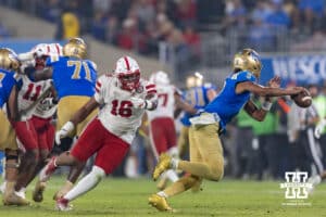 Nebraska Cornhusker defensive lineman Elijah Jeudy (16) chases UCLA Bruin quarterback Nico Iamaleava (9) during a college football game on Saturday, November 8, 2025, in Pasadena, California. Photo by John S. Peterson.