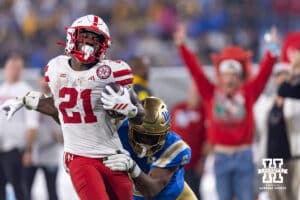 Nebraska Cornhusker running back Emmett Johnson (21) breaks a tackle against UCLA Bruin linebacker Jonjon Vaughns (6) for a touchdown in the third quarter during a college football game on Saturday, November 8, 2025, in Pasadena, California. Photo by John S. Peterson.