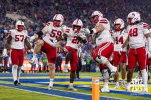 Nebraska Cornhuskers pose for a photo after running back Emmett Johnson (21) scores a touchdown against the UCLA Bruins in the second quarter during a college football game on Saturday, November 8, 2025, in Pasadena, California. Photo by John S. Peterson.