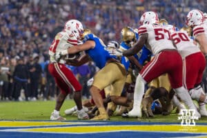Nebraska Cornhusker running back Emmett Johnson (21) slides in backwards for a touchdown against the UCLA Bruins in the second quarter during a college football game on Saturday, November 8, 2025, in Pasadena, California. Photo by John S. Peterson.
