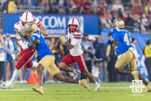 Nebraska Cornhusker quarterback TJ Lateef (14) runs with the ball against UCLA Bruin defensive back Key Lawrence (4) in the second quarter during a college football game on Saturday, November 8, 2025, in Pasadena, California. Photo by John S. Peterson.