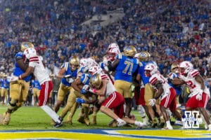 UCLA Bruin running back Jalen Berger (0) runs in for a touchdown against the Nebraska Cornhuskers in the first quarter during a college football game on Saturday, November 8, 2025, in Pasadena, California. Photo by John S. Peterson.
