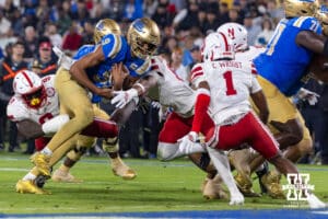 Nebraska Cornhusker defensive back Ceyair Wright (1) makes the stop against UCLA Bruin quarterback Nico Iamaleava (9) in the first quarter during a college football game on Saturday, November 8, 2025, in Pasadena, California. Photo by John S. Peterson.