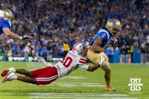 Nebraska Cornhusker defensive back Andrew Marshall (10) tackles UCLA Bruin running back Jalen Berger (0) in the first quarter during a college football game on Saturday, November 8, 2025, in Pasadena, California. Photo by John S. Peterson.