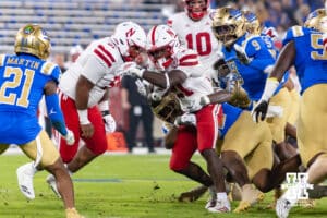 Nebraska Cornhusker running back Emmett Johnson (21) runs with the ball against the UCLA Bruins in the drive for the first touchdown during a college football game on Saturday, November 8, 2025, in Pasadena, California. Photo by John S. Peterson.