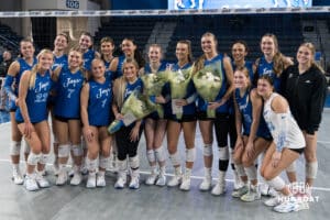 Creighton Bluejays smile together after a volleyball game against Georgetown on Sunday, November 9, 2025, in Omaha, Nebraska. Photo by Brandon Tiedemann.