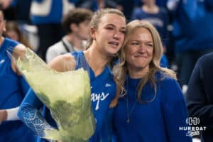 Creighton Bluejay Ava Martin #8 hugs her mom after a volleyball game against Georgetown on Sunday, November 9, 2025, in Omaha, Nebraska. Photo by Brandon Tiedemann.