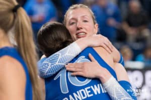 Creighton Bluejay Annalea Maeder #17 cries with a teammate after a volleyball game against Georgetown on Sunday, November 9, 2025, in Omaha, Nebraska. Photo by Brandon Tiedemann.