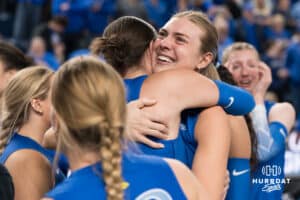 Creighton Bluejay Kiara Reinhardt #5 hugs a teammate after a win during a volleyball game against Georgetown on Sunday, November 9, 2025, in Omaha, Nebraska. Photo by Brandon Tiedemann.