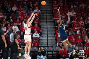 Nebraska Cornhusker Pryce Sandfort (21) shoots a three during a basketball game against Florida International University on Saturday, November 8, 2025, in Lincoln, Nebraska. Photo by Brandon Tiedemann.