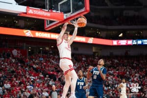 Nebraska Cornhusker Connor Essegian (0) dunks during a basketball game against Florida International University on Saturday, November 8, 2025, in Lincoln, Nebraska. Photo by Brandon Tiedemann.